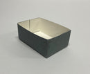 A rectangular metal egg tray with a reflective surface on the side, displayed on a plain background.